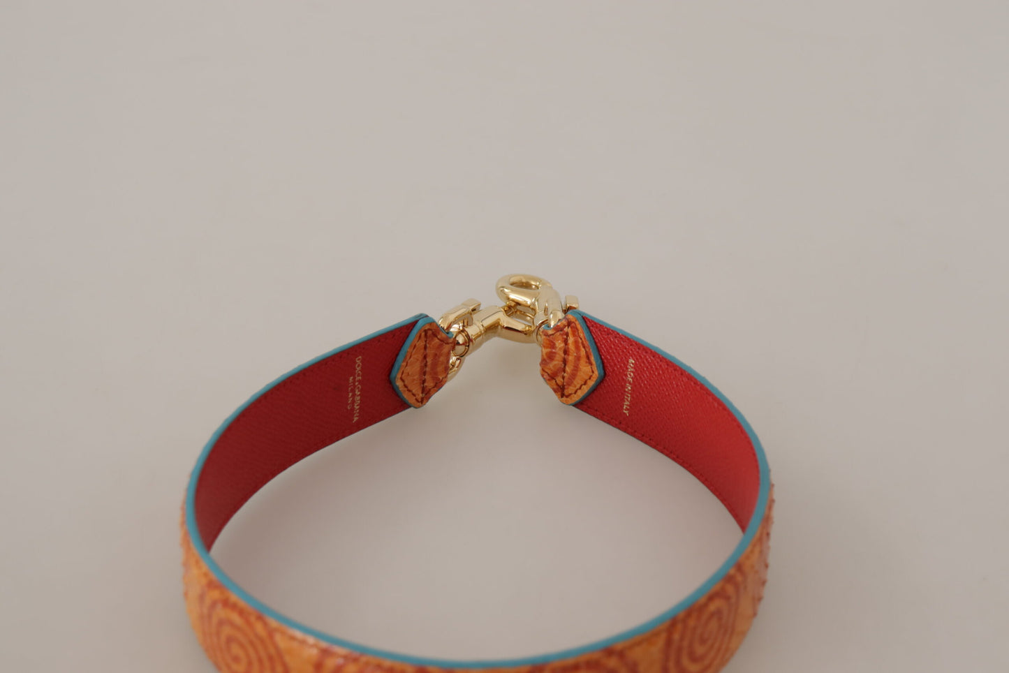 Dolce & Gabbana Schickes orangefarbenes Schultergurt-Accessoire aus Leder