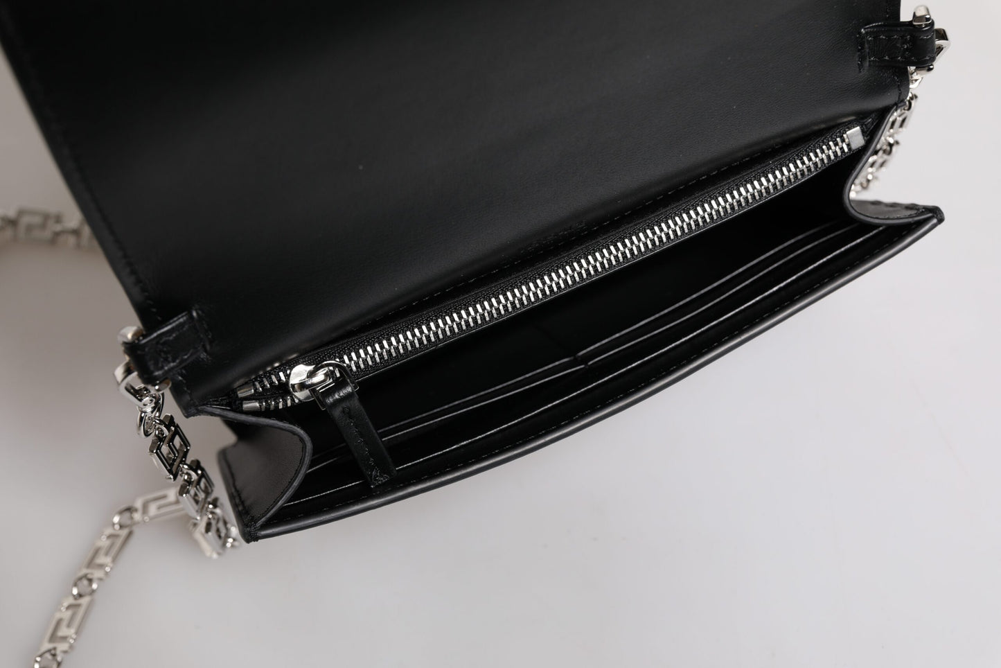Sac bandoulière Versace en cuir de veau noir avec chaîne