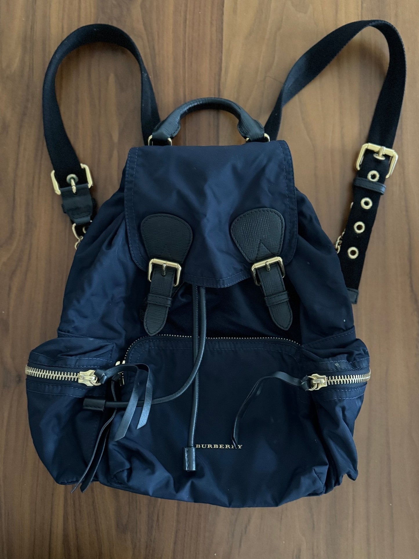 Burberry The Rucksack Backpack in Navy with Golden Hardware at The Platonist