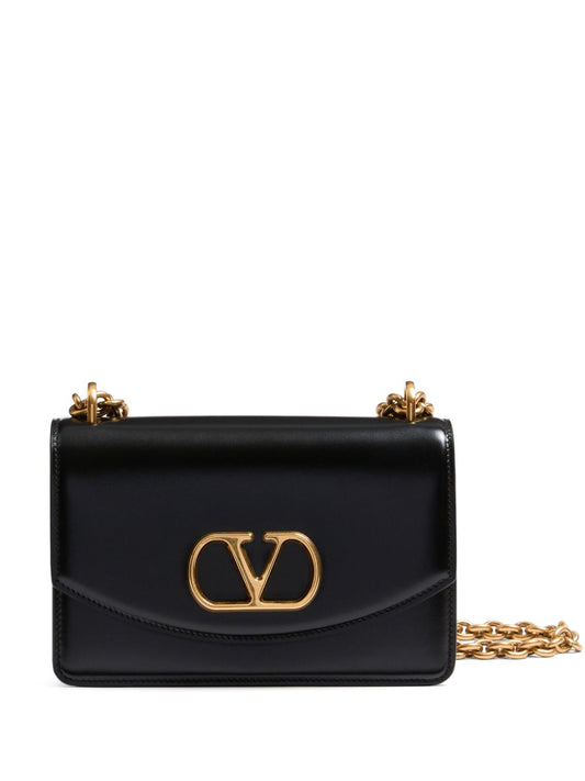 Petit sac à bandoulière Vain Valentino Garavani en cuir de veau brillant