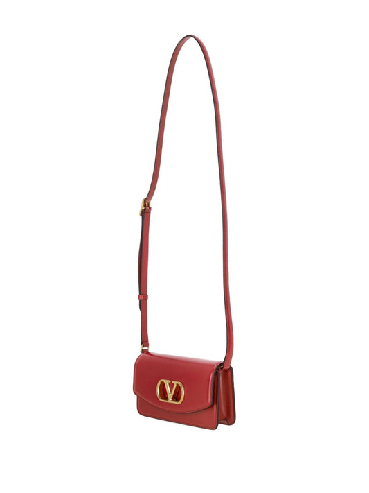 Petit sac à bandoulière Vain Valentino Garavani en cuir de veau brillant