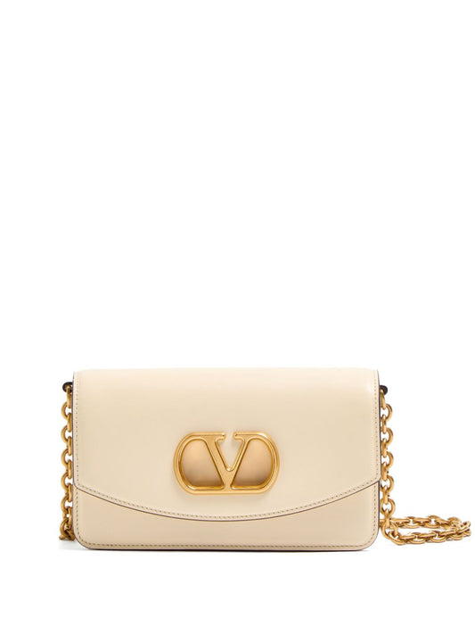 Pochette Vain Valentino Garavani en cuir de veau brillant