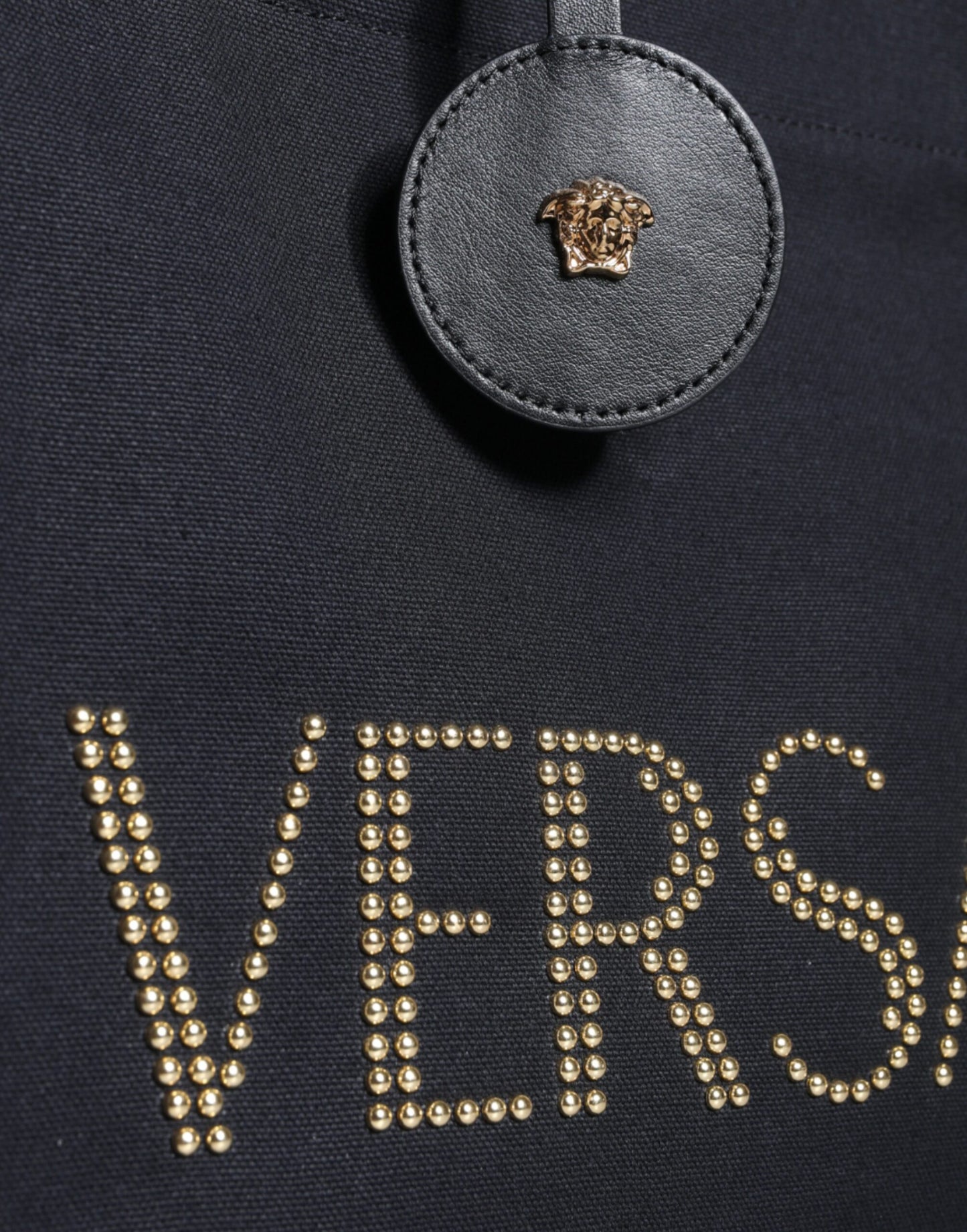 Sac fourre-tout à bandoulière en toile et cuir noir avec logo Versace